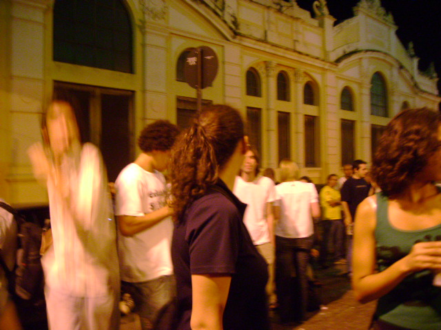 a group of people walking on the street