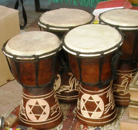 several wood drums with an inverted inverted design
