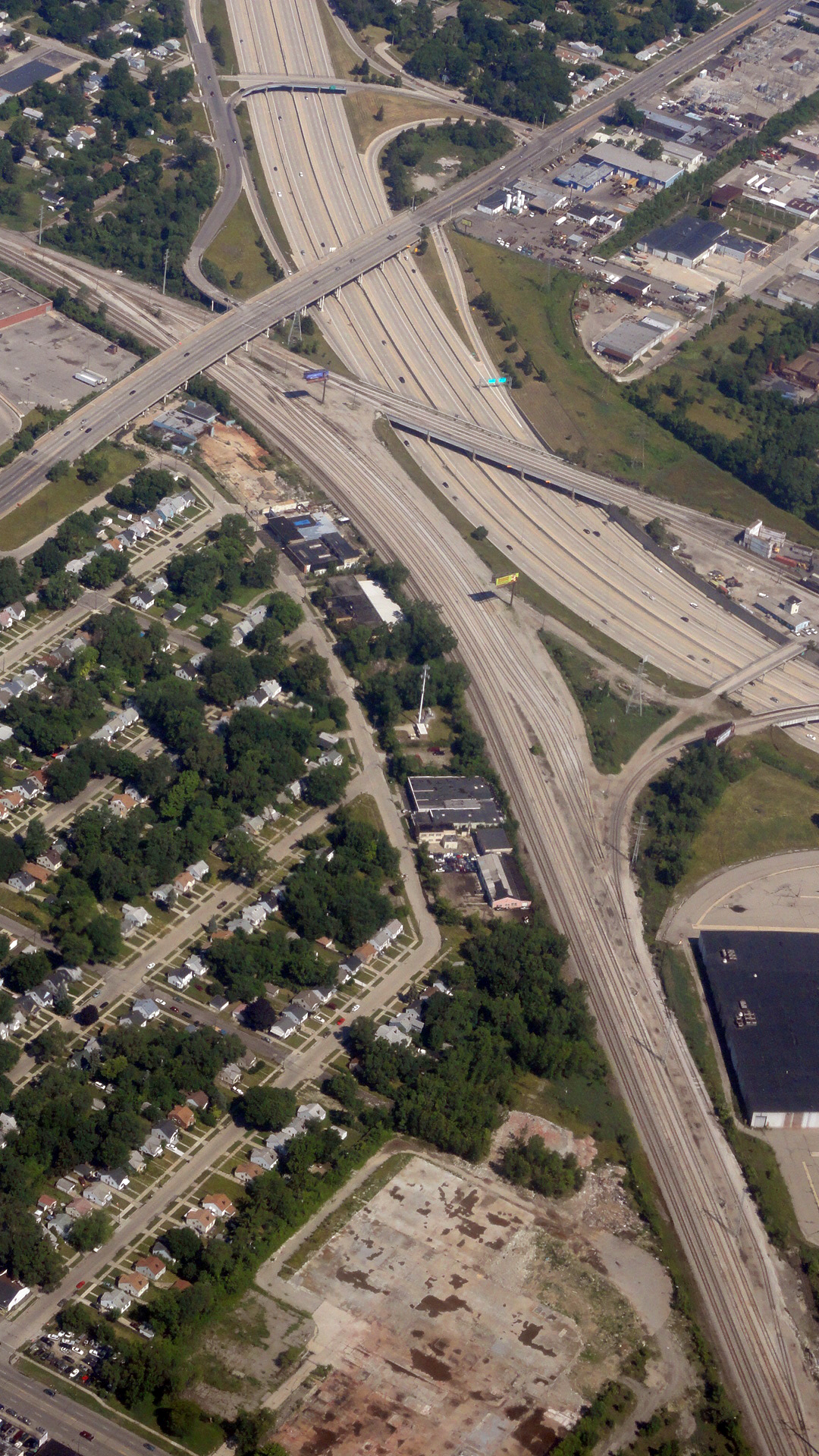 aerial view of multiple freeways in a large town