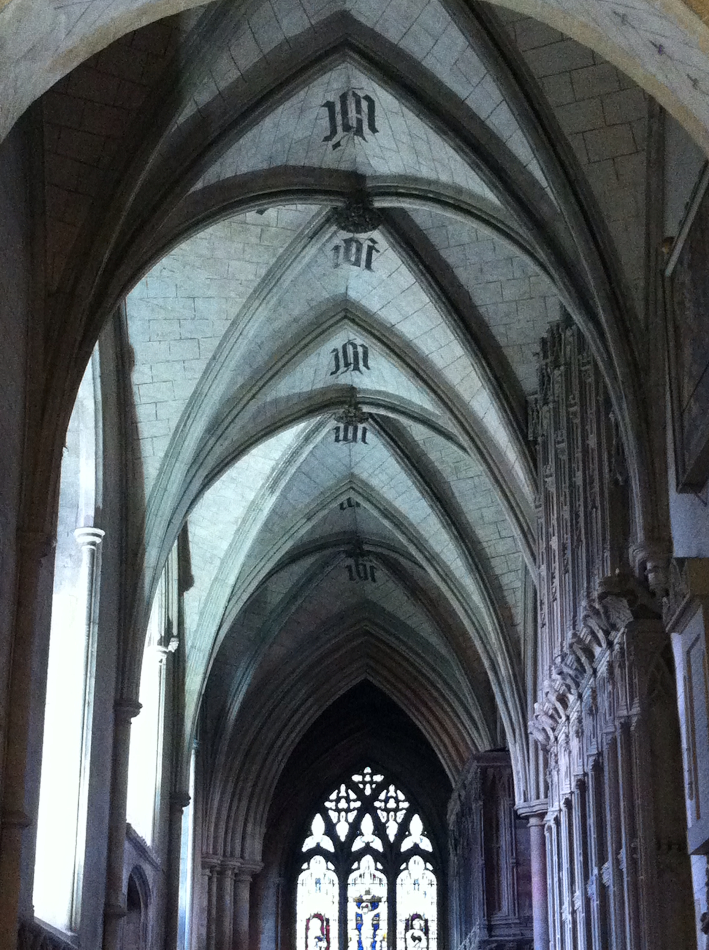 a church with large, tall cathedral ceilings and floor to ceiling pews