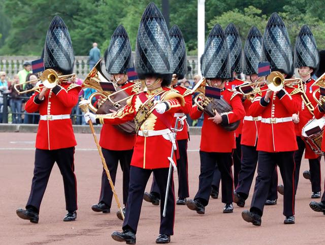 the london band is marching around in the park