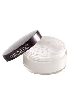 a jar of makeup product with a lid