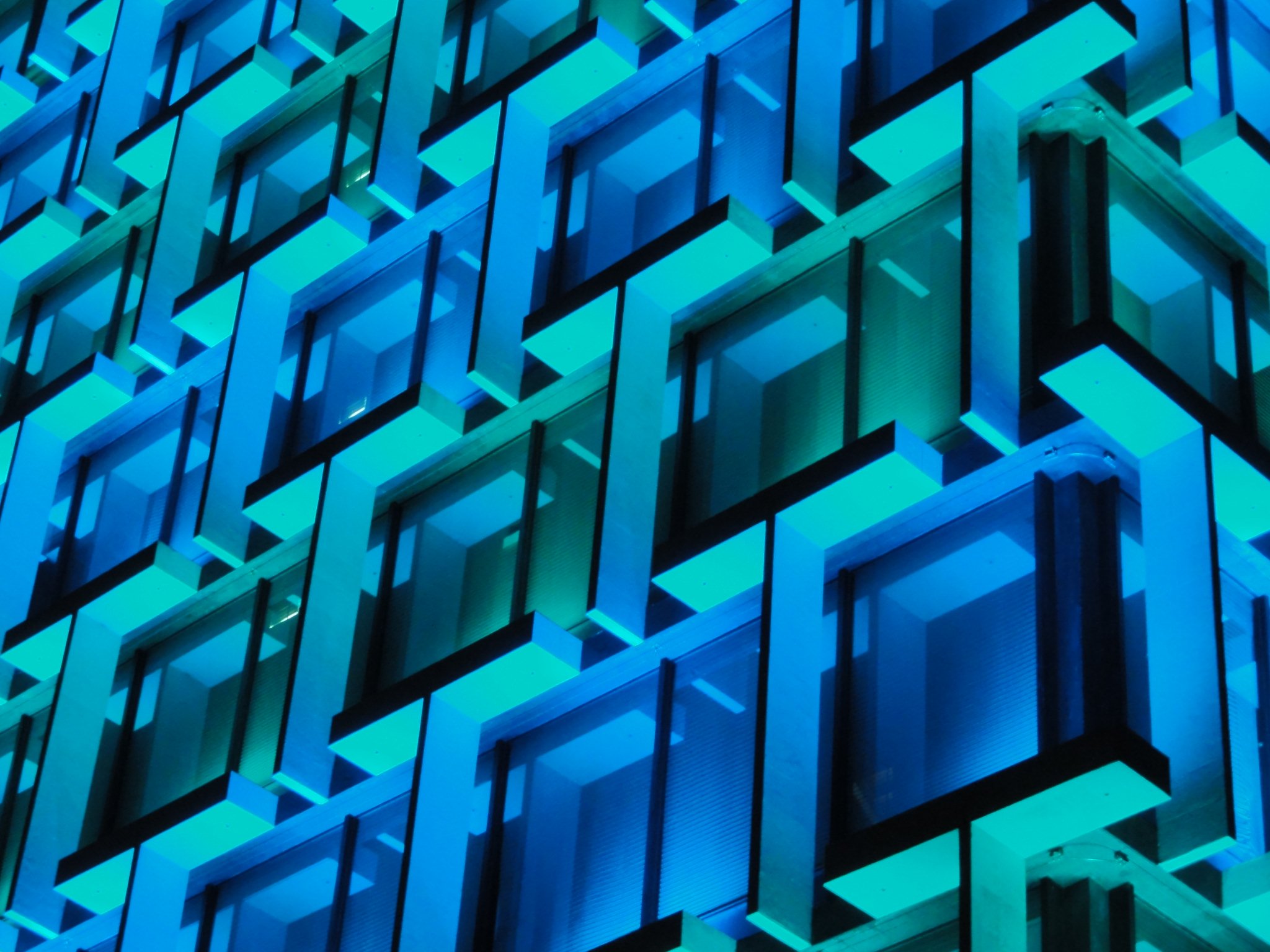 the abstract facade of a building painted in blue