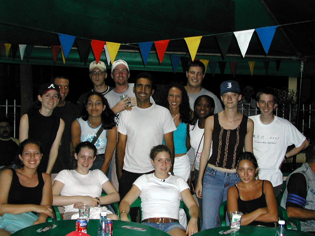 the group is posing for the camera in a tent