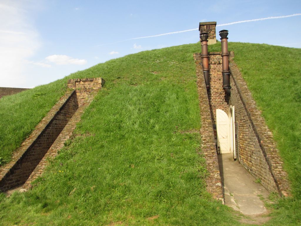 a wall with a pipe protruding out of it