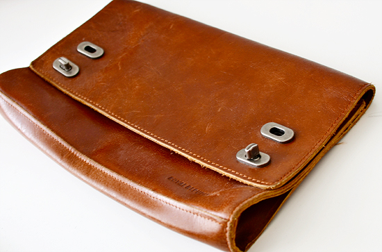 the large leather case has two different compartments