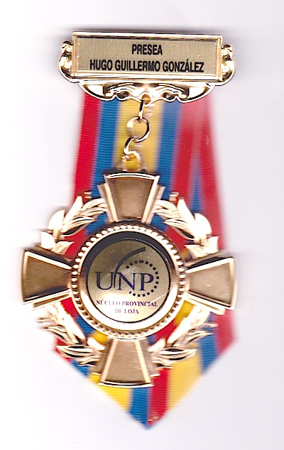 a trophy shaped medal with multiple colors and decorations