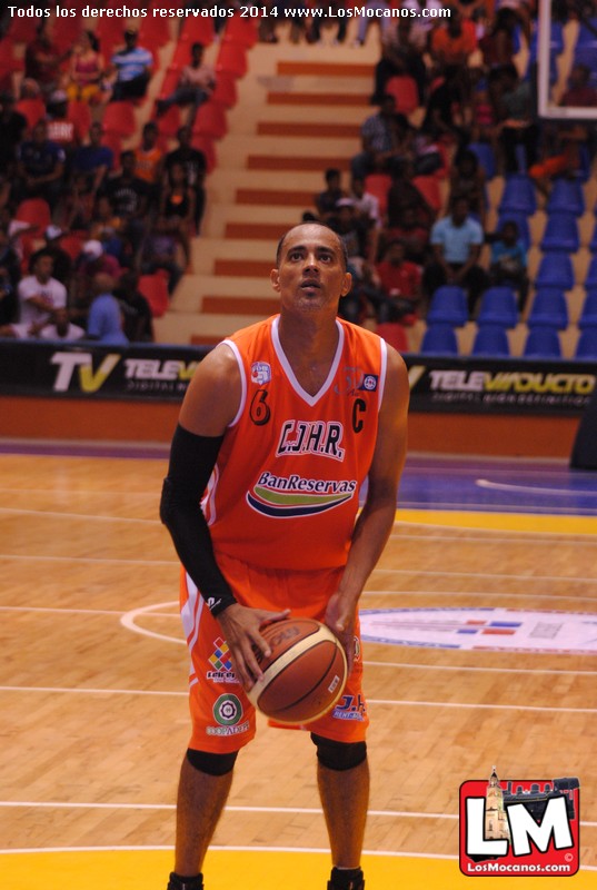 an image of basketball player in the middle of court