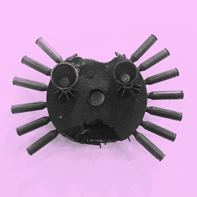 an object is featured on a pink background