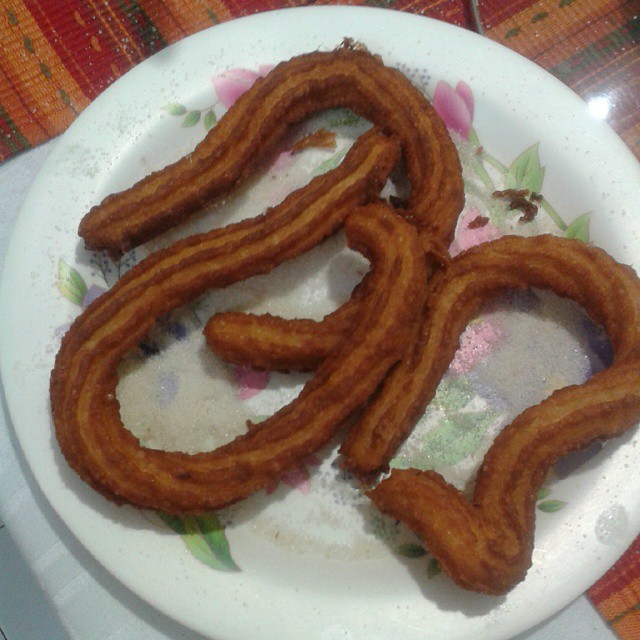 a plate holds two long, thin worms