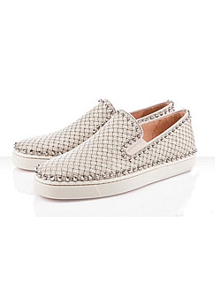 a pair of men's slip ons with silver stones