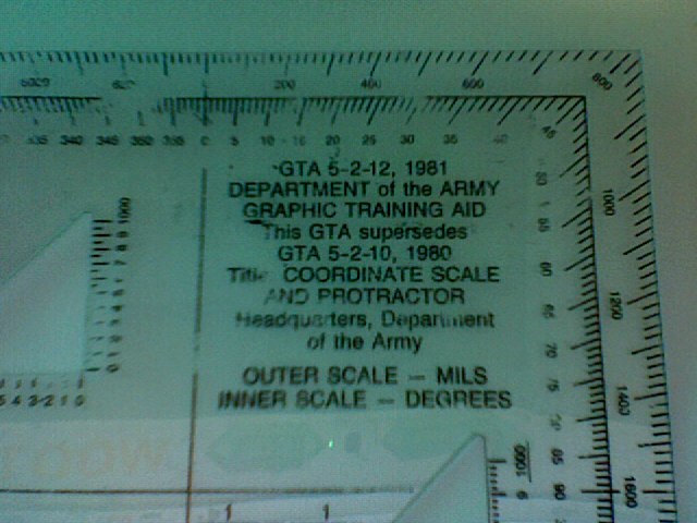 an open view of a picture showing the measurements of a piece of equipment