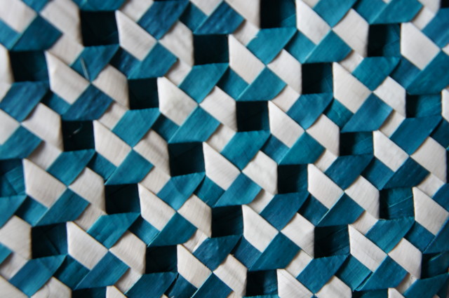 a close up po of woven material made with different shades of blue