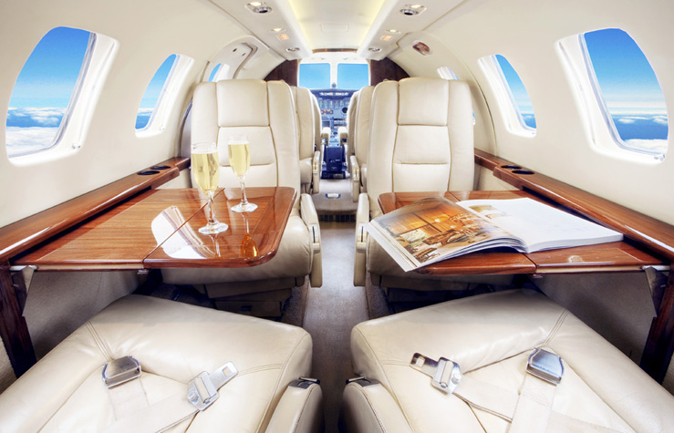 a private flight with two tables and chairs set up in it