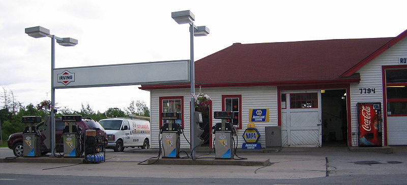 a gas station with an old gas station
