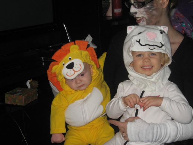 two babies dressed up in halloween costumes