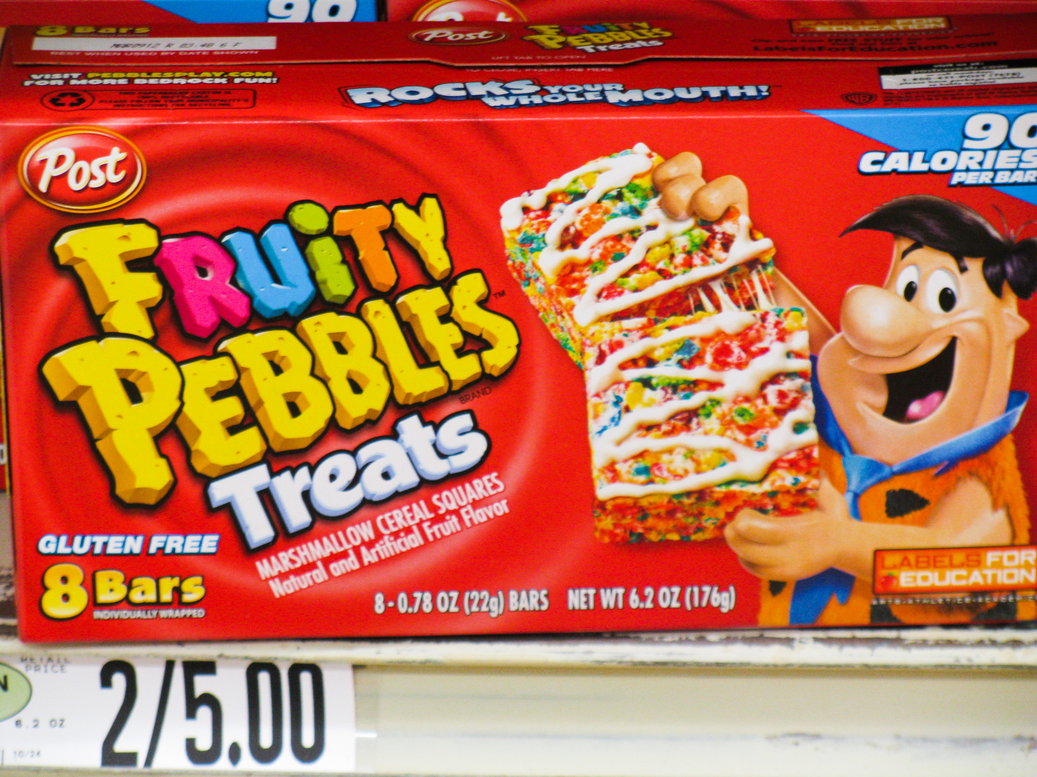 a fruity pebbles treats display in a store