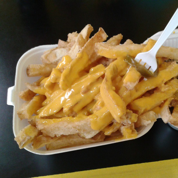 a lunch with french fries in a container