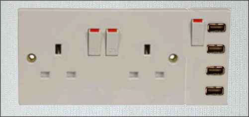 this is a double outlet in a white wall plate