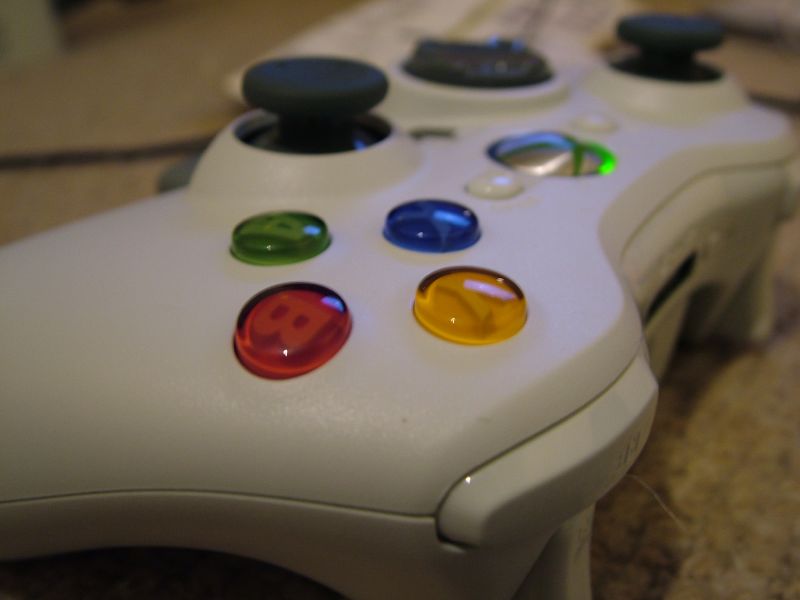 the front of a white video game controller