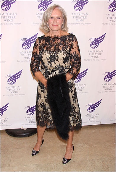 a lady posing at the gala with her fur