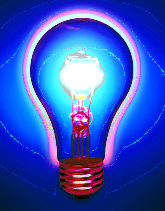 a glowing light bulb in a dark blue background