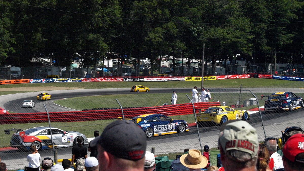 racing cars on the race track during a race