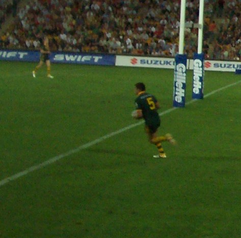 the rugby player in action on the field
