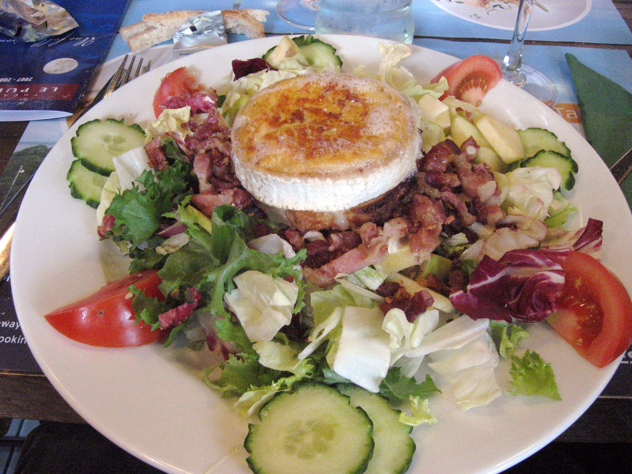 a close up of a plate of food with a sandwich