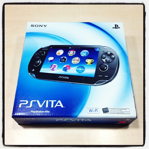 a box of sony vita in front of a box