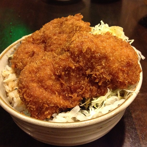 some fried food is on top of a big bowl