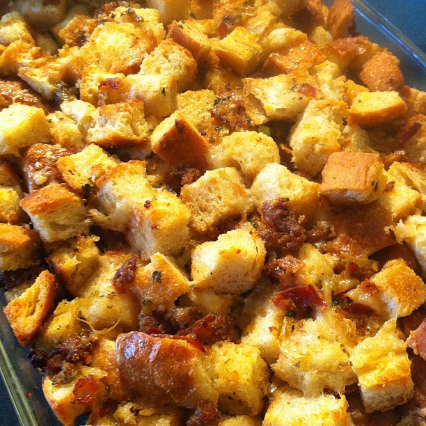 a pan full of bread and sausage for stuffing