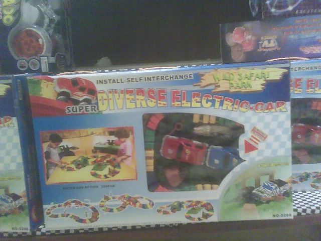 the box is full of toys and is displayed