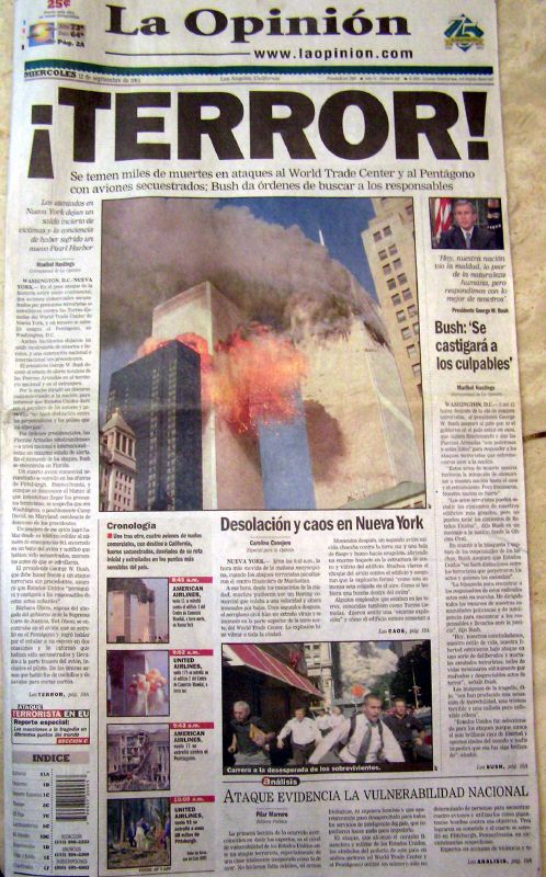 a newspaper with a very large fire burning in the air