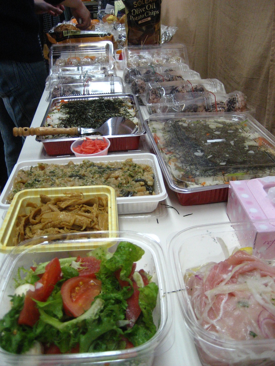 various containers of food on display on table