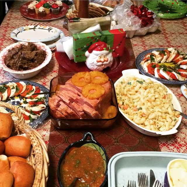 large spread of food with various foods and condiments
