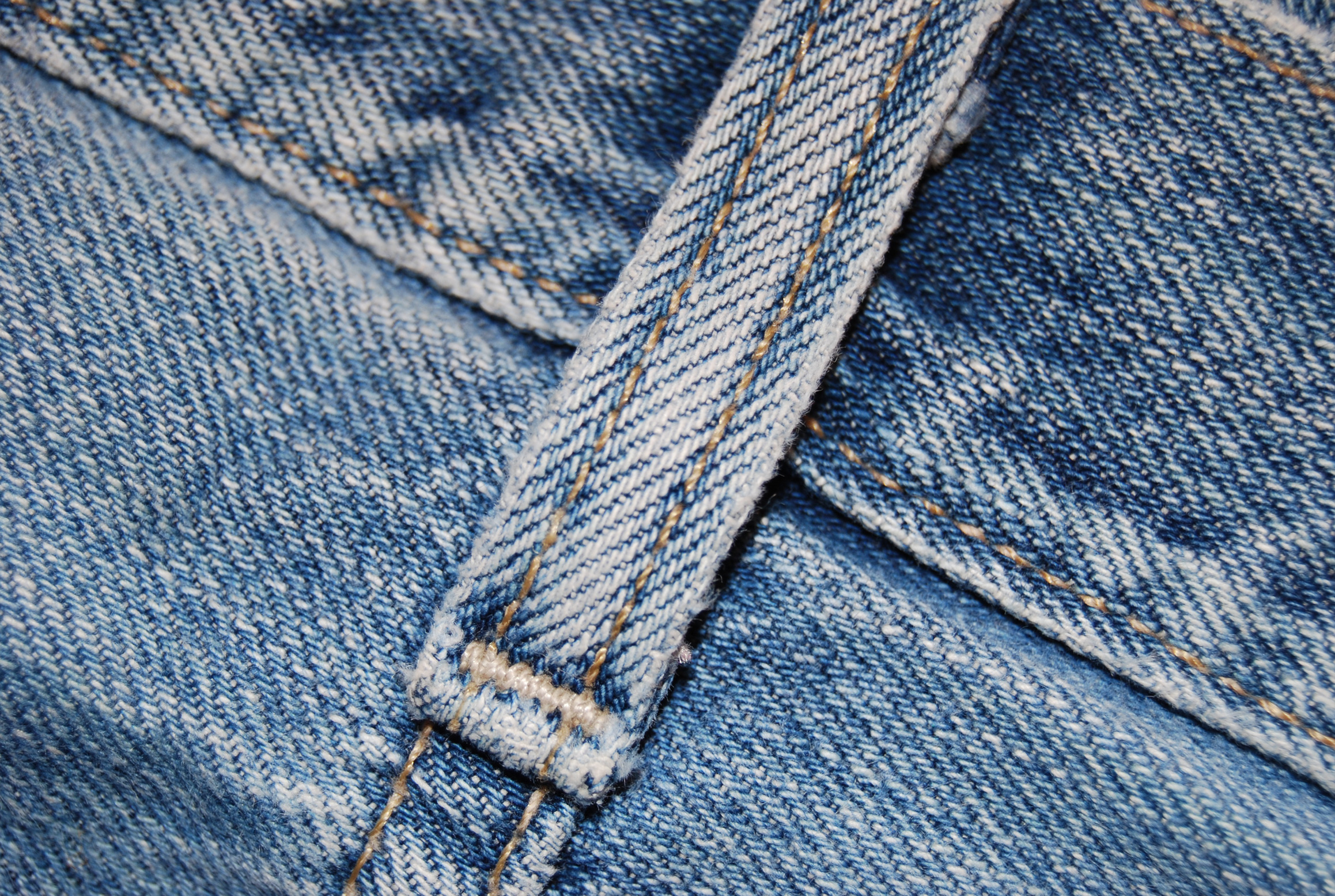 the bottom side of jeans that has a zip in it