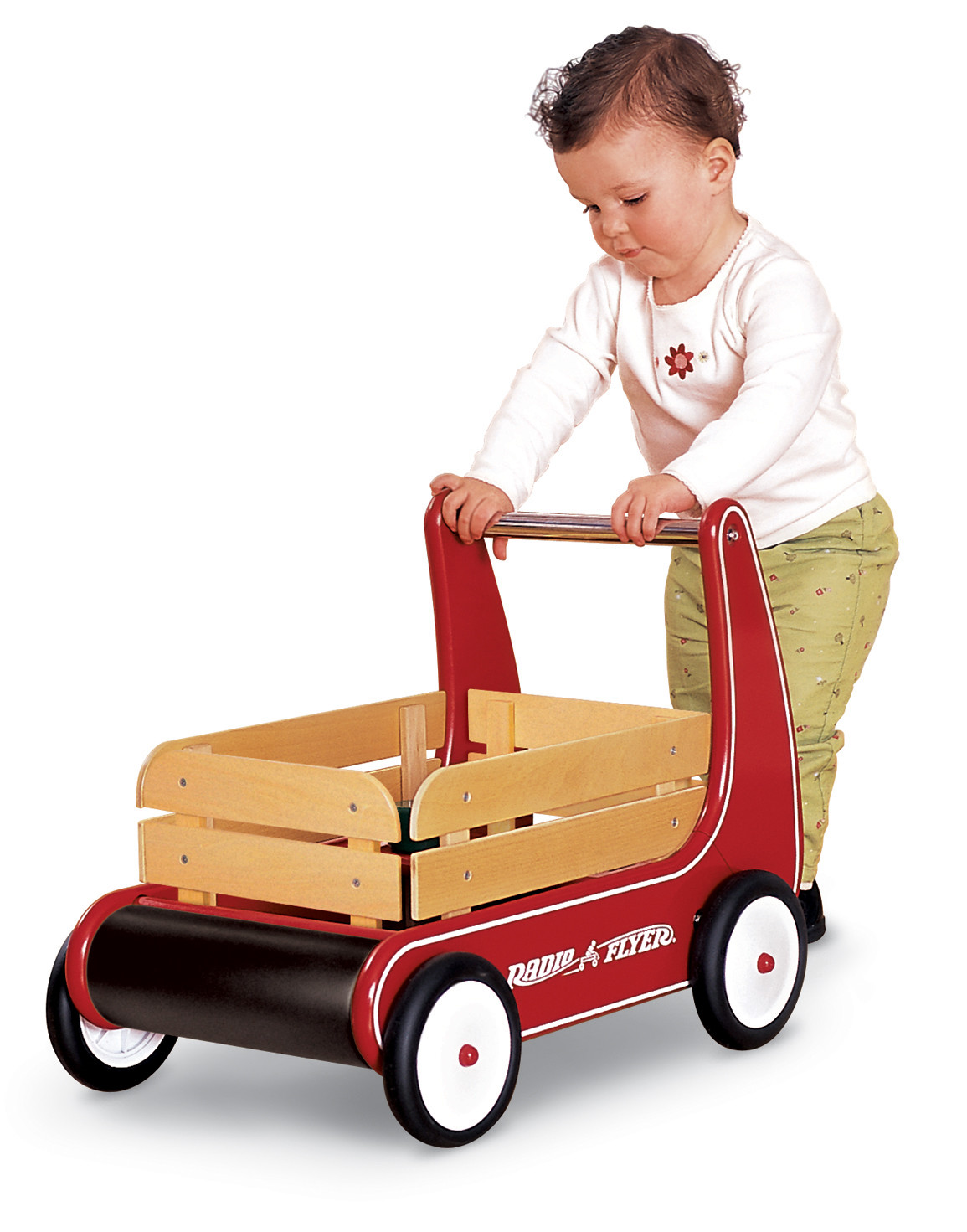 a small baby hing a wooden wagon with wheels