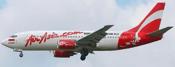 a commercial air plane taking off in the air