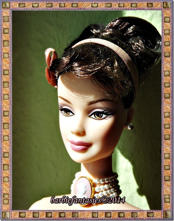 an image of a doll with hair and pearls