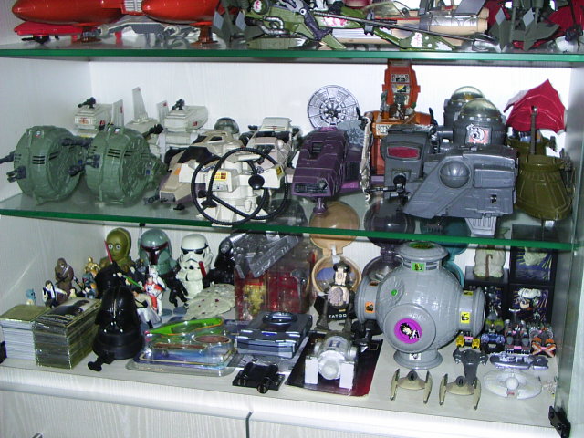 a collection of action figures and other toys