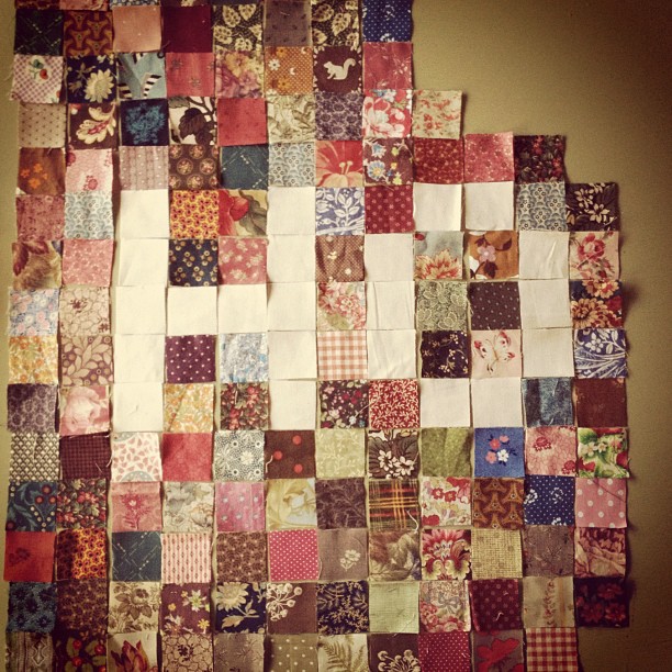 large quilted piece is made up of many different patterns