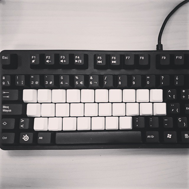 a keyboard and mouse sitting on a table