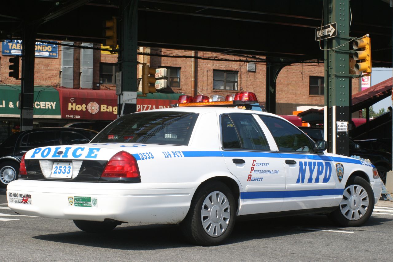 an image of a police car in the city
