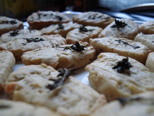 a close up s of some biscuits with olives on them