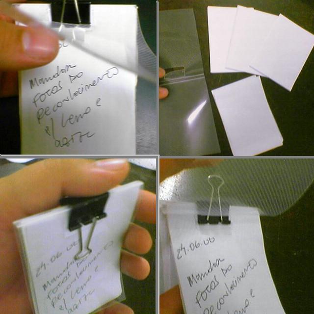 paper notes and clothes pins are attached to post it notes