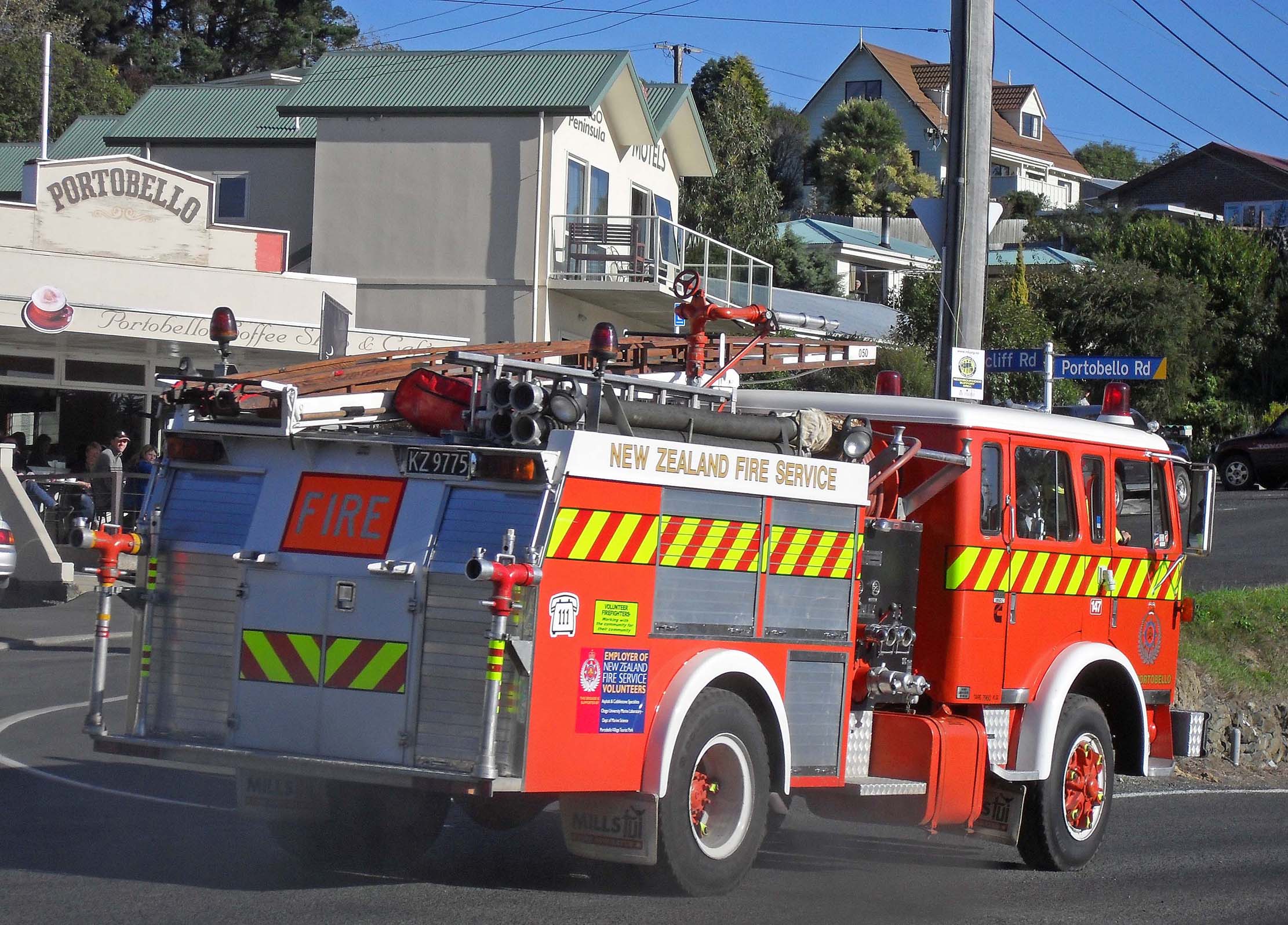 the fire truck is driving down the street