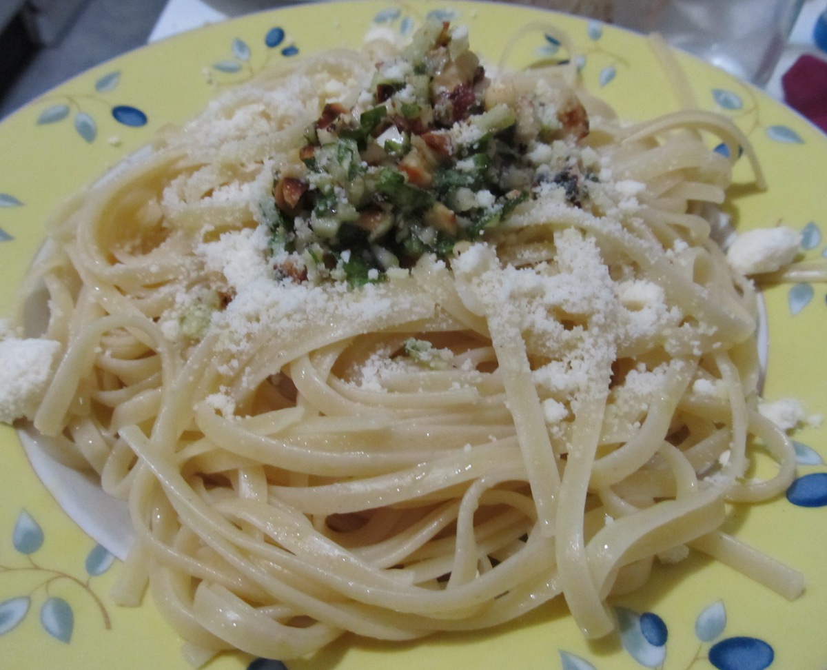 spaghetti with pesto, ricotta squash, and olives