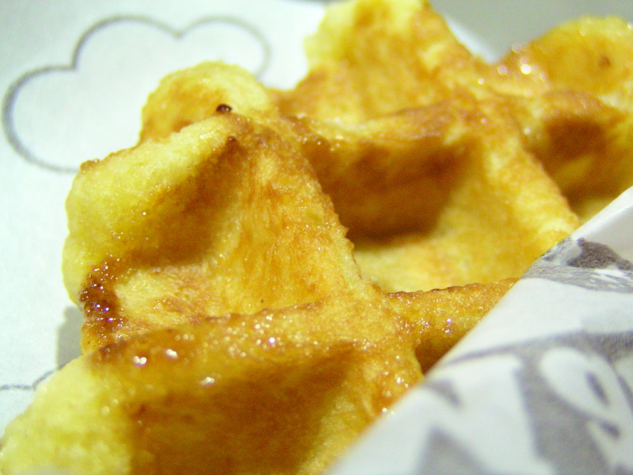 the breakfast pastry contains egg holes with syrup and bread