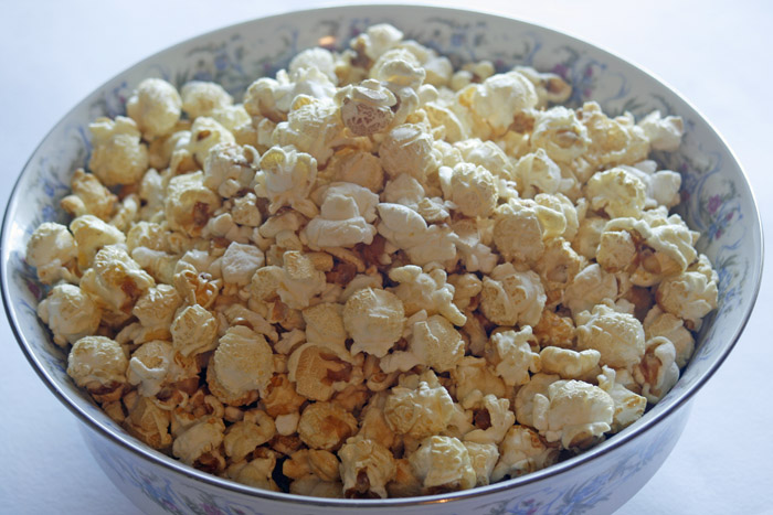 a bowl of popcorn is placed on the counter